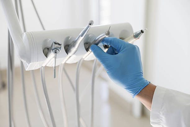 Professional Tooth Extraction technician working in West Branch, IA
